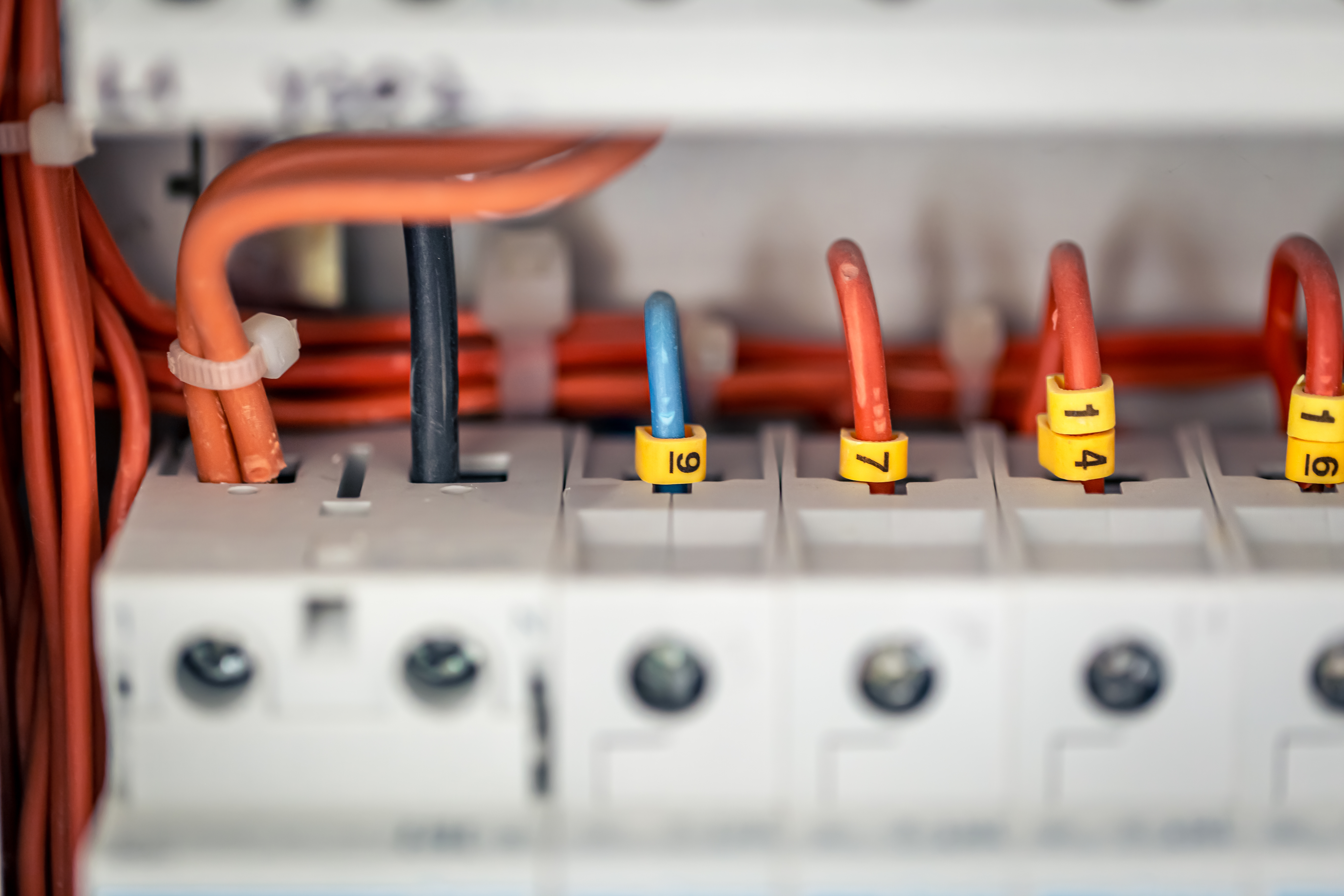 Electrical panel with fuses and contactors, close-up.